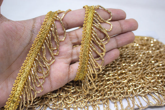 Tassel & Trim In Antique Gold Cutdana - 3 Meter